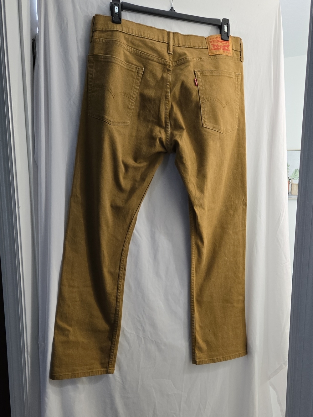 Levi's 513 Straight-Leg Jeans in Mustard Brown
